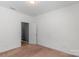 Bright bedroom with a neutral color palette and a view to another room at 3296 Saddlebrook Dr, Midland, NC 28107