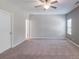 Spacious bedroom with neutral paint, carpet and ceiling fan at 3296 Saddlebrook Dr, Midland, NC 28107