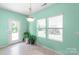 Bright breakfast nook featuring natural light from large windows and a glass door leading to the outside at 3296 Saddlebrook Dr, Midland, NC 28107