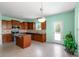 Open kitchen featuring stainless steel appliances, granite countertops, and stylish cabinetry at 3296 Saddlebrook Dr, Midland, NC 28107