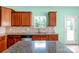 Updated kitchen featuring granite countertops, stainless appliances, and tile backsplash at 3296 Saddlebrook Dr, Midland, NC 28107