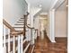 Spacious hallway featuring hardwood floors, detailed molding, and an open floor plan at 344 S Laurel Ave, Charlotte, NC 28207