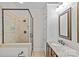 Bright bathroom showcasing a glass-enclosed shower and granite vanity at 3535 Selwyn Farms Ln, Charlotte, NC 28209