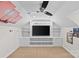 Bonus room features built in bookshelves and display cabinets at 3535 Selwyn Farms Ln, Charlotte, NC 28209
