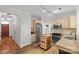 Functional kitchen with updated stainless steel appliances, granite countertops, and tile floors at 3535 Selwyn Farms Ln, Charlotte, NC 28209
