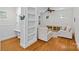 Living room featuring hardwood floors, built-in shelving and comfortable furniture at 3535 Selwyn Farms Ln, Charlotte, NC 28209