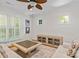 Comfortable living room featuring modern furniture, hardwood floors and bright windows at 3535 Selwyn Farms Ln, Charlotte, NC 28209
