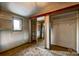 Bedroom featuring neutral carpet, natural light, and a sliding-door closet to maximize space at 3607 Austin Rd, Monroe, NC 28112