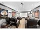 Luxury home theater with projector, screen, and cozy seating, perfect for entertainment at 3981 Spinnaker Pl, Denver, NC 28037