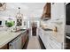 An expansive kitchen with marble countertops, pendant lighting, and an open layout at 3981 Spinnaker Pl, Denver, NC 28037