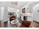 Inviting living room featuring a stylish bar area and views to an outdoor dining area at 3981 Spinnaker Pl, Denver, NC 28037