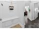 Mudroom with built in bench and storage and easy access to the main living area at 3981 Spinnaker Pl, Denver, NC 28037