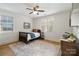 Cozy bedroom with a dark wood bed, side table, and dresser at 508 Mcalway Rd, Charlotte, NC 28211