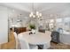 Well lit dining room adjacent to a spacious kitchen and stairs to the second level at 508 Mcalway Rd, Charlotte, NC 28211