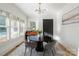 Charming dining area with a round table, modern light fixture, and ample natural light at 508 Mcalway Rd, Charlotte, NC 28211