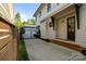 Spacious driveway with a gated fence, side yard, and detached garage at 508 Mcalway Rd, Charlotte, NC 28211