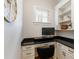 Cozy home office with custom cabinets, a built-in desk, and a modern aesthetic at 508 Mcalway Rd, Charlotte, NC 28211