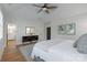 Open main bedroom with tray ceilings, ensuite access, and hardwood flooring at 508 Mcalway Rd, Charlotte, NC 28211