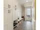 Stylish mudroom with built-in storage, patterned tile flooring, and a convenient bench at 508 Mcalway Rd, Charlotte, NC 28211