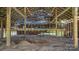 Barn interior featuring post and beam construction with abundant natural light at 5560 Springs Rd, Conover, NC 28613
