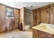 Bathroom featuring a tub/shower, sink and vanity with linoleum flooring at 5560 Springs Rd, Conover, NC 28613