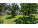 Charming front yard with a quaint house nestled among mature trees and lush greenery at 5560 Springs Rd, Conover, NC 28613