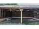 Interior view of a vintage outbuilding with wood framing and rustic charm at 5560 Springs Rd, Conover, NC 28613