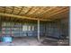 Interior view of the shed with sturdy framework and wooden beams, offering ample storage space at 5560 Springs Rd, Conover, NC 28613