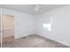 Empty bedroom with white walls and carpet shows the room's layout and size at 5727 Faulconbridge Rd, Charlotte, NC 28227