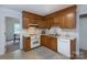 Efficient kitchen layout with plenty of storage, modern appliances, and a cozy breakfast nook nearby at 5727 Faulconbridge Rd, Charlotte, NC 28227