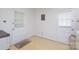 Mud room features two doors with blinds, offering versatile entry points and ample natural light at 5727 Faulconbridge Rd, Charlotte, NC 28227