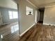 Hallway with hardwood floors with access to other rooms at 60 White Oaks Dr, Taylorsville, NC 28681