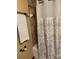 Small bathroom features decorative patterned shower curtain and towel rack at 6039 Donna Dr, Charlotte, NC 28213