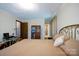 Cozy bedroom with carpet flooring, neutral walls, and a comfortable bed at 6039 Donna Dr, Charlotte, NC 28213