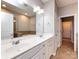 Bright bathroom featuring double sink, tile flooring, vanity and access to tub, shower and toilet room at 621 Pine Links Dr, Tega Cay, SC 29708
