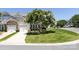 Townhome exterior with attached garage and well-maintained lawn and landscaping at 621 Pine Links Dr, Tega Cay, SC 29708