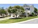 Charming townhome with beautiful landscaping and a well-manicured front yard at 621 Pine Links Dr, Tega Cay, SC 29708