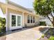 Outdoor patio with brick, a gas line and new double doors to the home's interior at 621 Pine Links Dr, Tega Cay, SC 29708