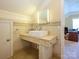 Unique powder room featuring tiled wall and a vessel sink at 6311 Red Maple Dr, Charlotte, NC 28277