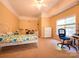 Spacious bedroom with carpet, a ceiling fan, large window, and room for activities at 6311 Red Maple Dr, Charlotte, NC 28277