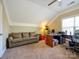 Spacious bonus room with a couch, desk, and carpeting at 6311 Red Maple Dr, Charlotte, NC 28277