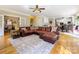 Spacious living room with hardwood floors, open layout, and easy access to the kitchen and dining area at 6311 Red Maple Dr, Charlotte, NC 28277
