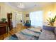Inviting living room with bright natural light, hardwood floors, and comfortable seating at 6311 Red Maple Dr, Charlotte, NC 28277