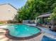 Enjoy a beautiful backyard swimming pool, lounge chairs, and gazebo, perfect for relaxing and entertaining at 6311 Red Maple Dr, Charlotte, NC 28277