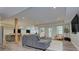 Finished basement boasts a spacious seating area, kitchenette, and neutral decor at 6326 Jepson Ct, Charlotte, NC 28214