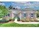 Charming stone home with manicured landscaping, inviting entrance, and beautiful curb appeal at 6326 Jepson Ct, Charlotte, NC 28214