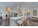 Open kitchen featuring a large center island with bar seating and stainless steel appliances at 6326 Jepson Ct, Charlotte, NC 28214