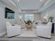 Inviting living room features recessed lighting, neutral tones, and ample seating at 6326 Jepson Ct, Charlotte, NC 28214