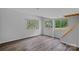 Finished basement featuring a large window and hardwood floors at 640 Lochaven Rd, Weddington, NC 28173