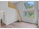 Bedroom featuring a lofted space, high ceilings, and large windows at 640 Lochaven Rd, Weddington, NC 28173
